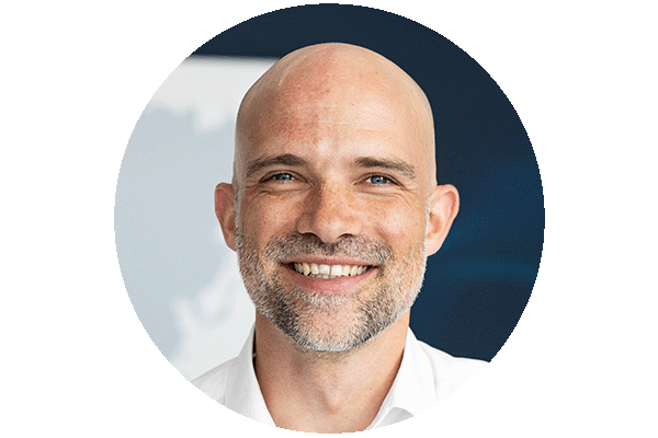 Headshot of Felix Borgiel, Product Manager Software and Tools  at Festo, smiling into the camera.