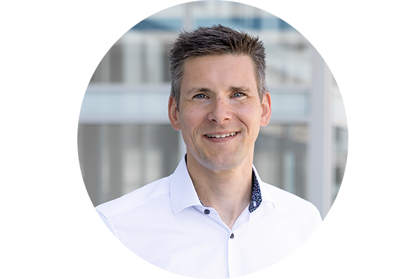 Headshot of Nils Hunger, Development Fluidic Manifolds, smiling into the camera.